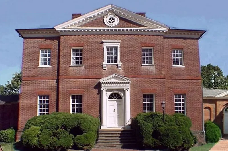 The red-brick Hammond-Harwood House facade with its central door and wings