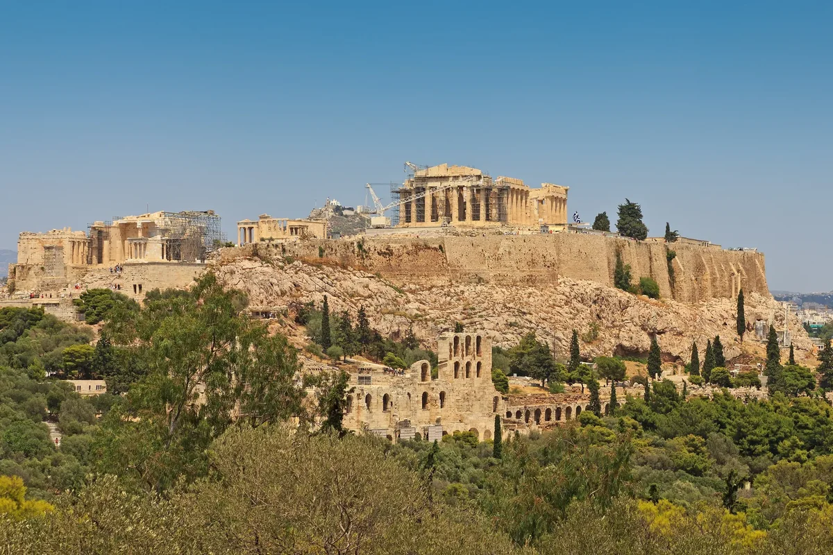 The Acropolis on its rock above Athens, seen across the pines of Philopappos Hill