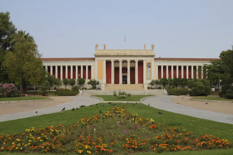 The columned front of the National Archaeological Museum behind its garden