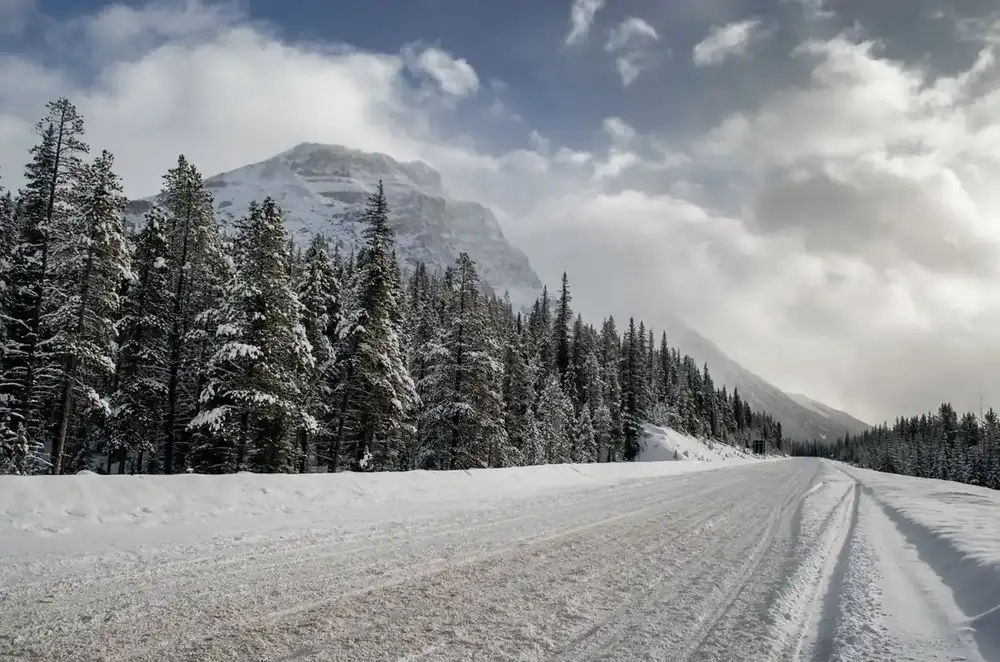 A snowy mountain highway in the Canadian Rockies