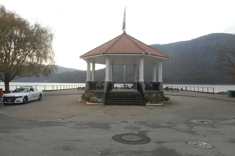 The white gazebo on the Cold Spring waterfront with the Highlands behind