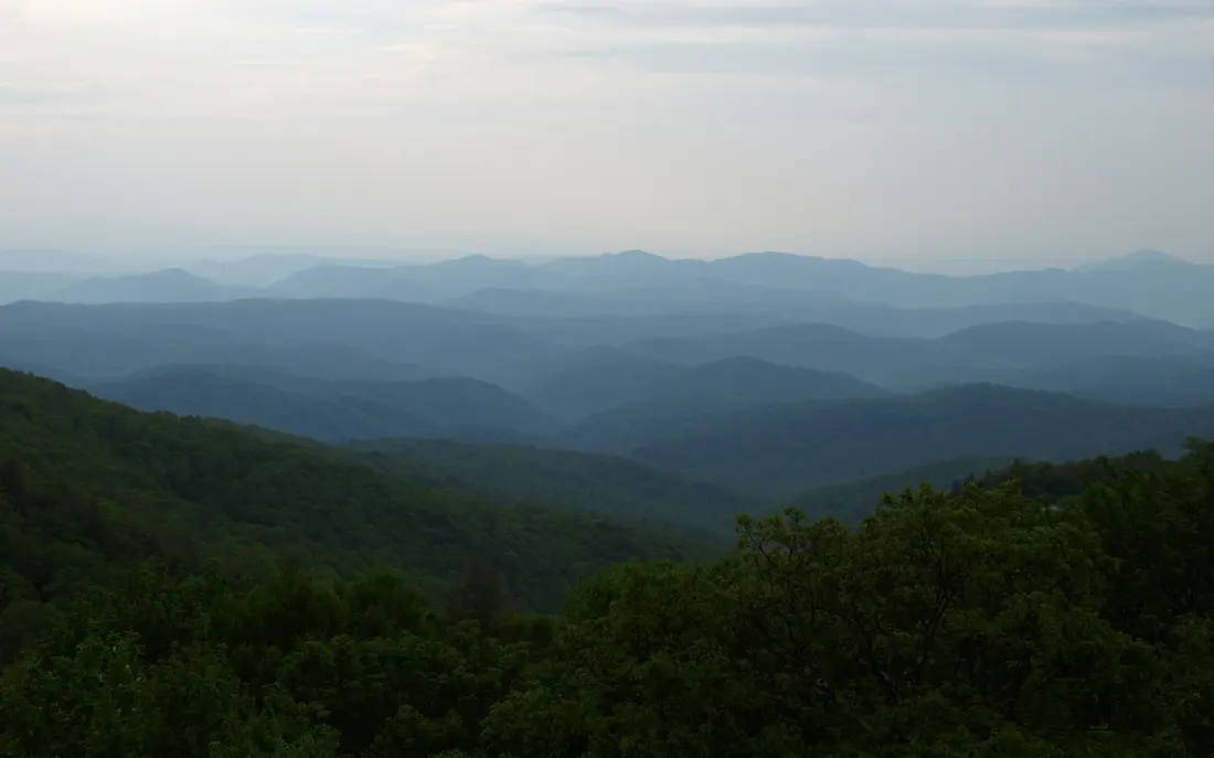 Layered blue ridges of the Blue Ridge Mountains fading to the horizon
