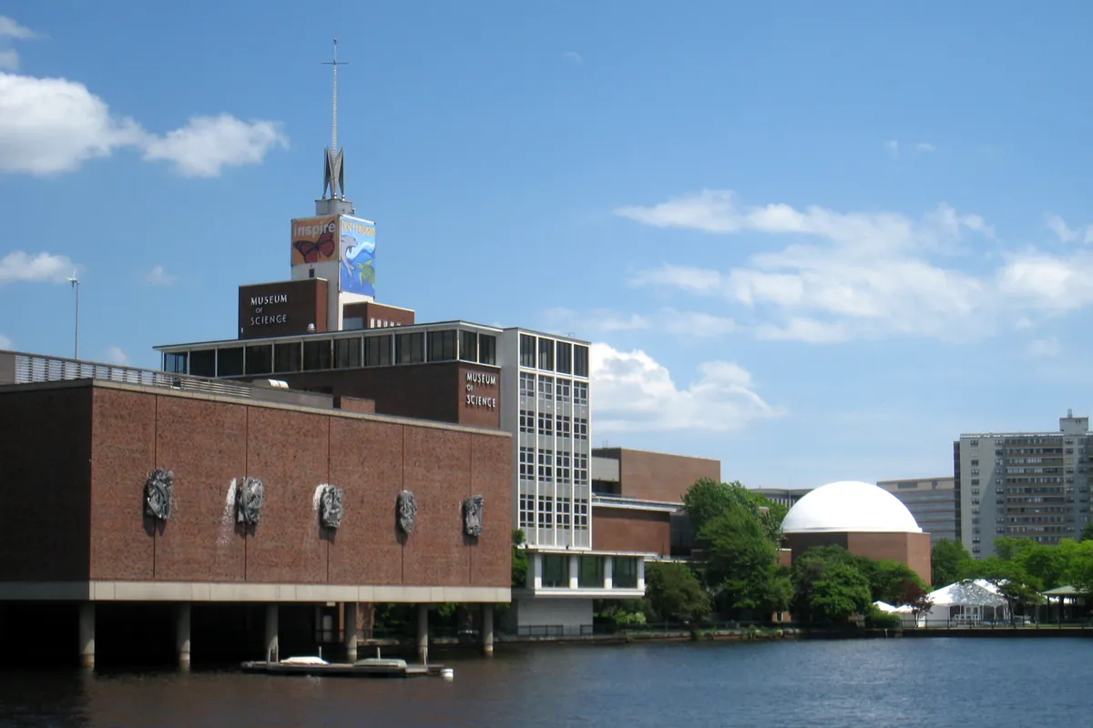 The Museum of Science on the Charles River Dam, with its brick and glass buildings over the water