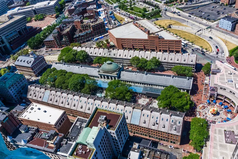 Quincy Market and Faneuil Hall seen from above, with the long market hall between brick buildings