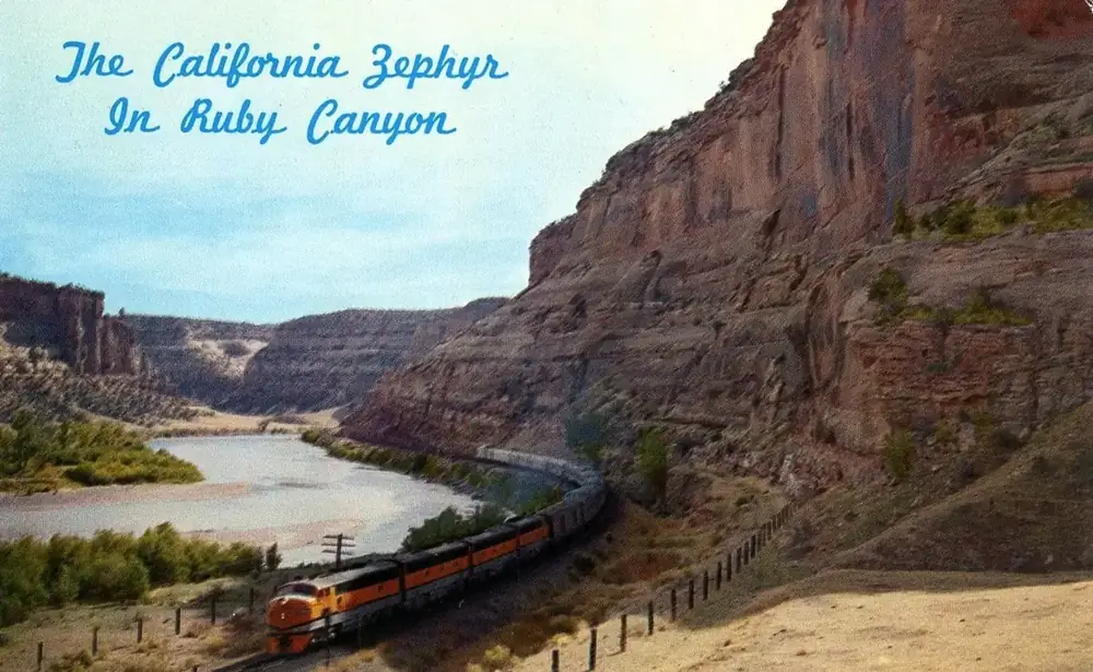 The California Zephyr in Ruby Canyon's red rock gorge