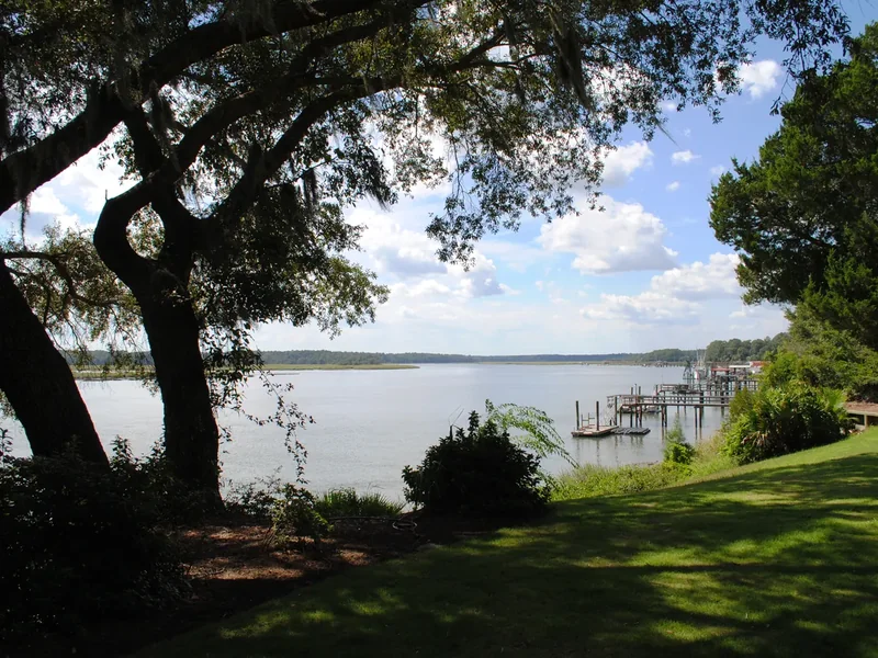 The wide May River seen from the bluff at Old Town Bluffton, with marsh grass along the far shore