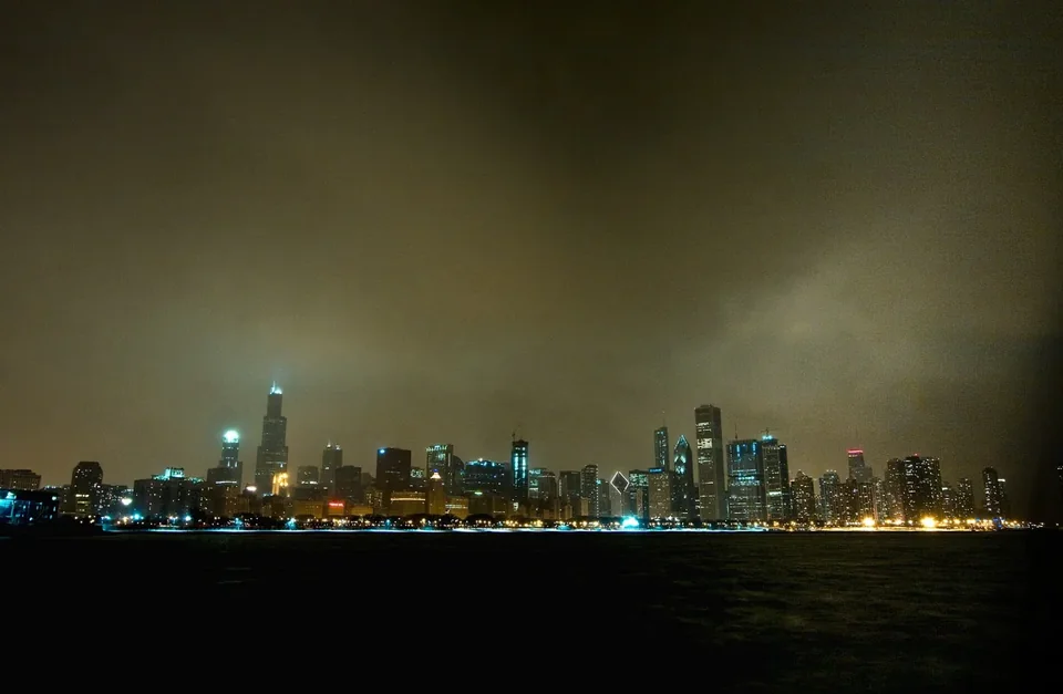 The Chicago skyline across the frozen lake on a winter night