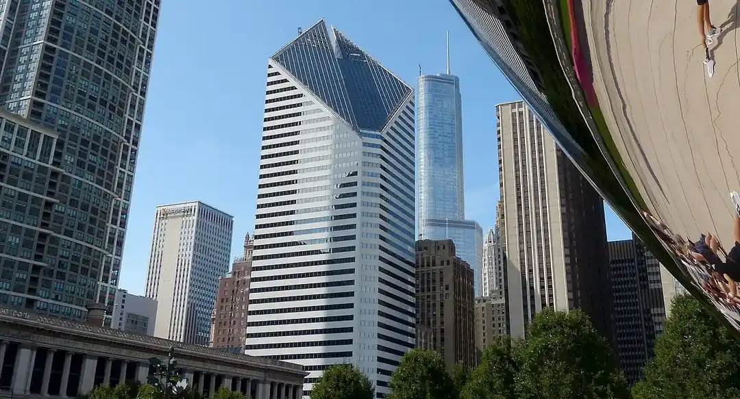 Chicago skyline seen from beneath Cloud Gate at Millennium Park
