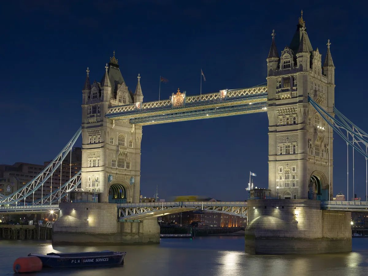Tower Bridge lit at dusk over the River Thames