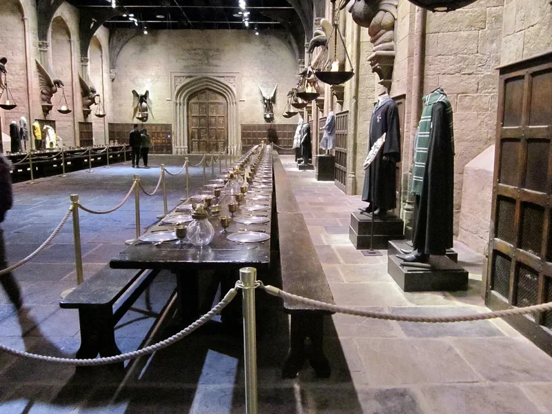 The long Great Hall set at the Warner Bros. studio at Leavesden, with tables and costumes