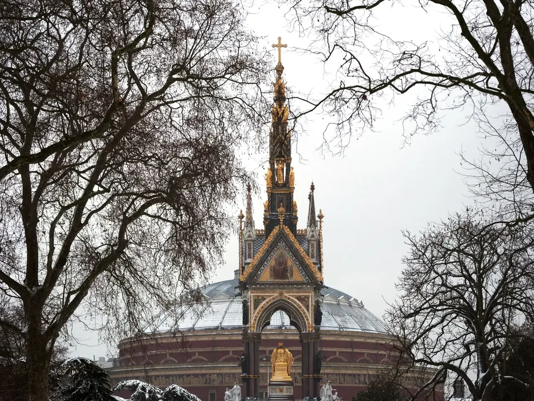The Albert Memorial in Kensington Gardens framed by bare winter trees