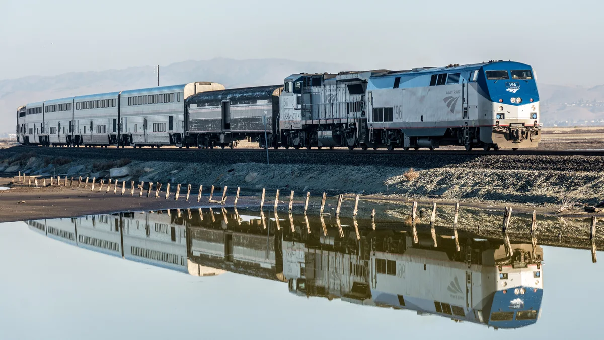 The real Coast Starlight Superliner train gliding past Alviso Marina
