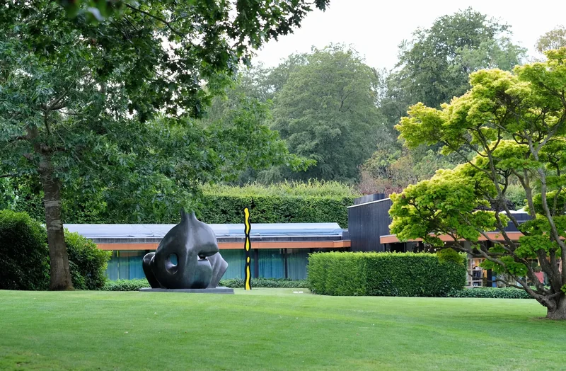 The Louisiana Museum of Modern Art in Humlebæk, low buildings among trees by the sea