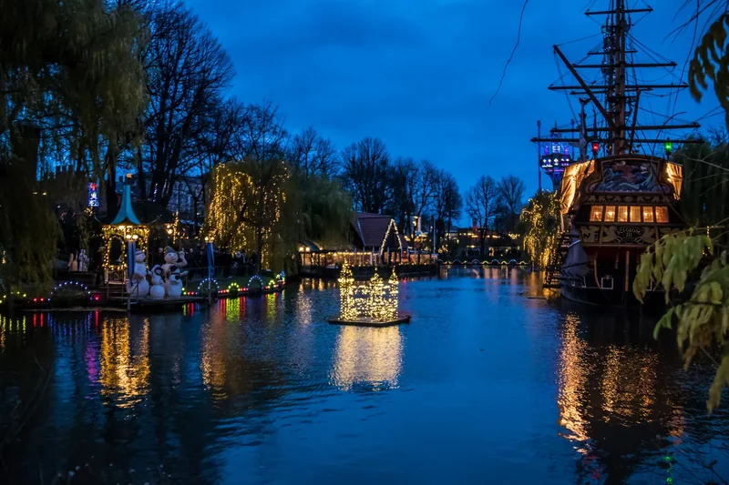 Christmas lights and decorated stalls in Tivoli Gardens at night