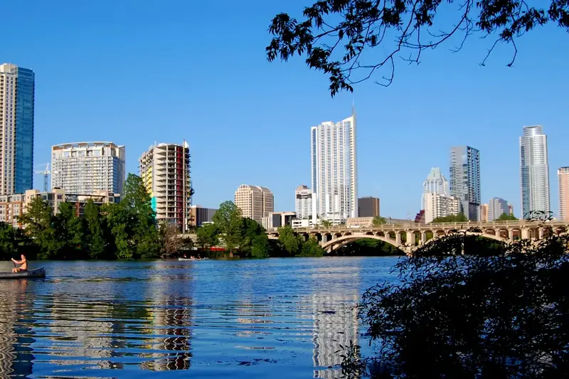 The downtown Austin skyline reflected in Lady Bird Lake