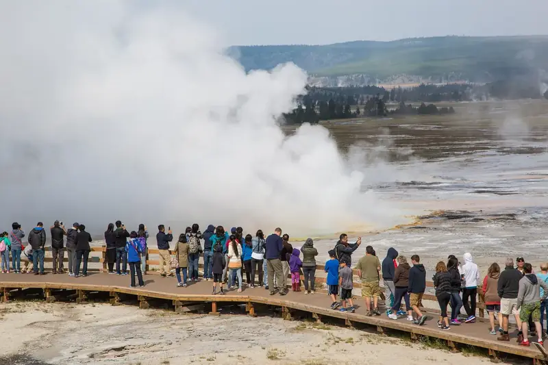 Visitors on a crowded boardwalk in Yellowstone’s Lower Geyser Basin