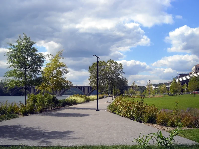 Georgetown Waterfront Park on the Potomac River, with lawns, paths and the river