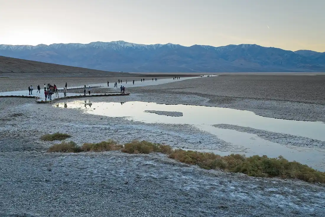 Badwater Basin salt flat with snow-capped Panamint Range