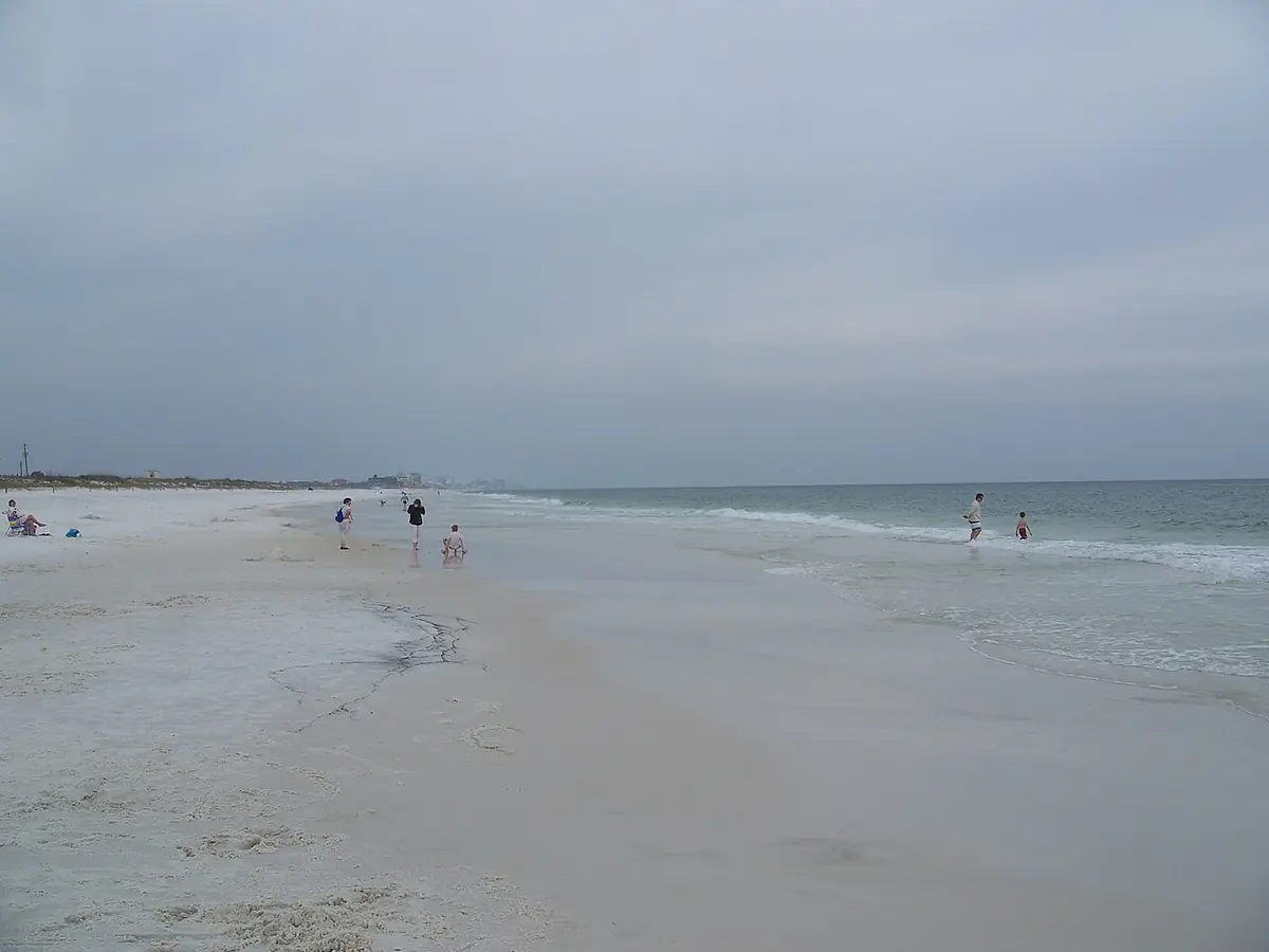 Sugar-white sand and gentle surf at Henderson Beach State Park
