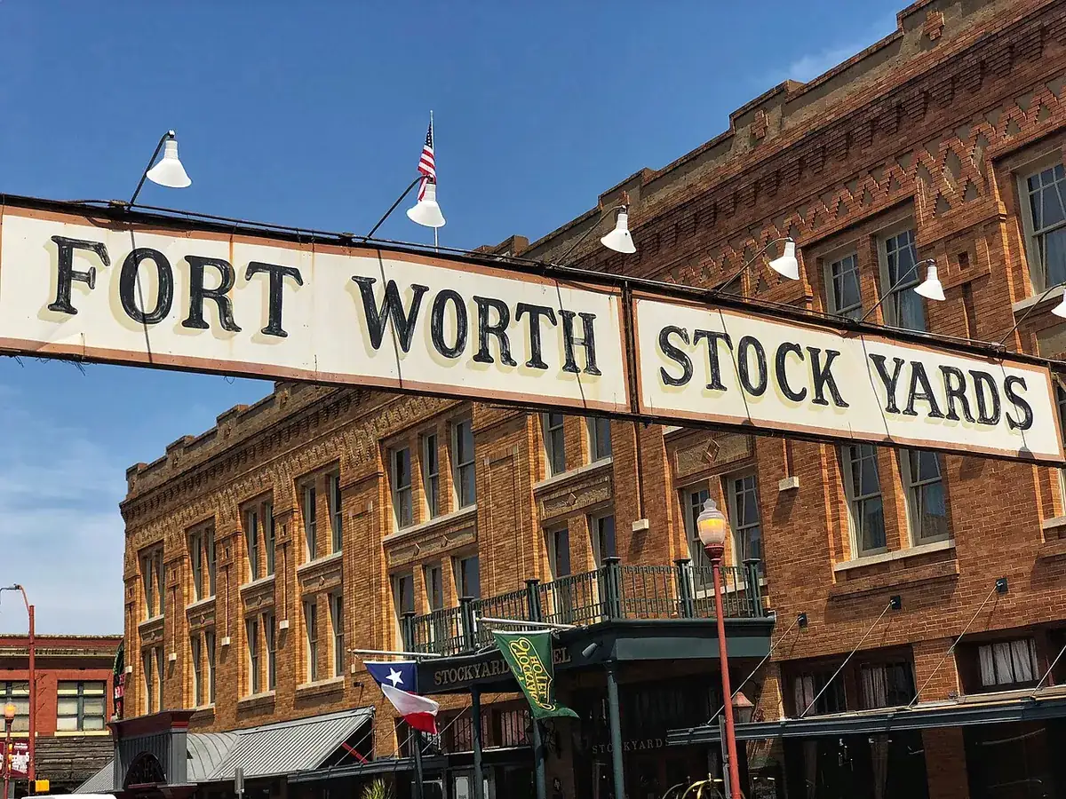Midday sun over the Stockyards brick streets