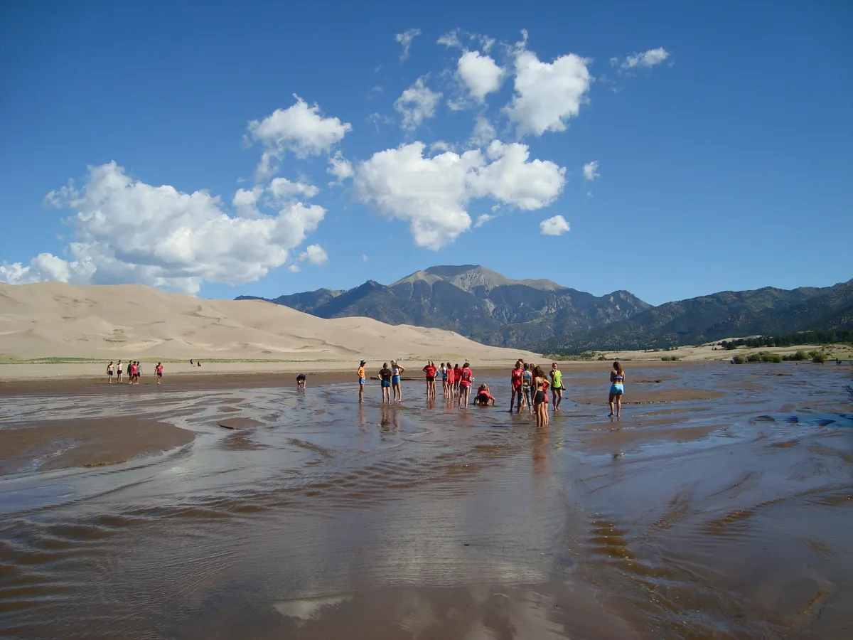 Medano Creek with dunes and the Sangre de Cristo Mountains