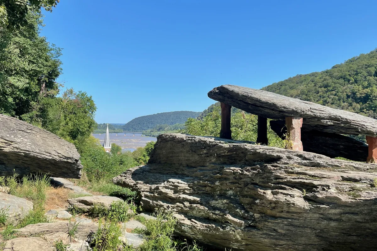 Jefferson Rock in Harpers Ferry, a flat shale slab on stone pillars above the river valley
