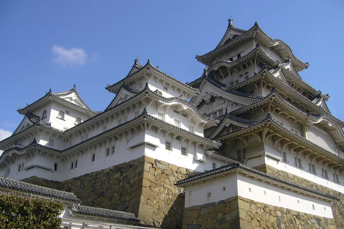 The main keep of Himeji Castle with its white walls and layered roofs