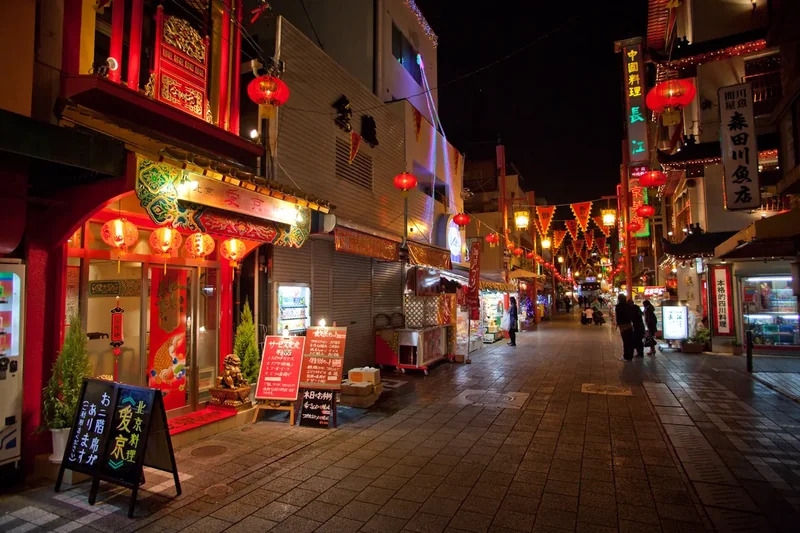 Lanterns and food stalls in Kobe’s Nankinmachi at night