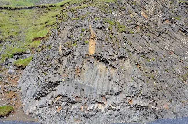 Basalt columns at Reynisfjara black beach in winter wind