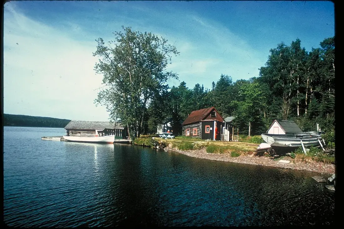 Cabins on a calm Isle Royale lakeshore