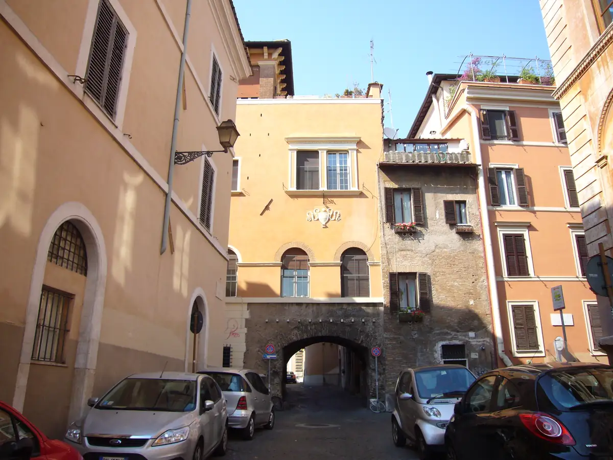 Warm stone lanes and archways in Trastevere, Rome