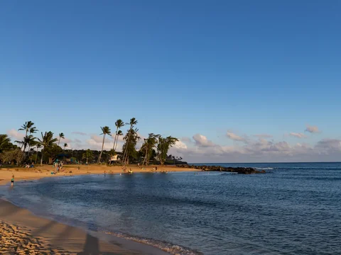 Crescent coves and a sheltered pool at Poʻipū Beach Park