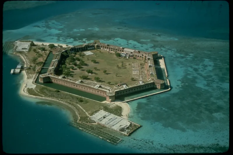 Aerial view of six-sided Fort Jefferson on Garden Key surrounded by turquoise water