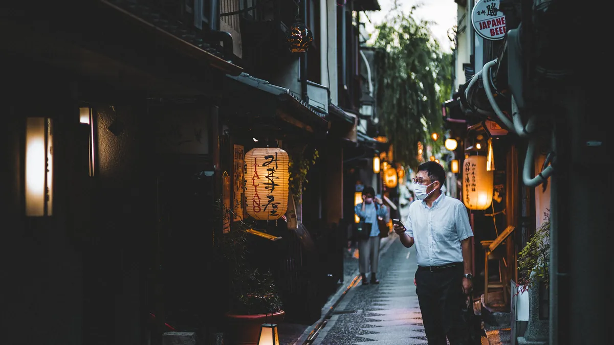 Pontocho Alley in Kyoto, a narrow lane of wooden restaurant fronts and lanterns