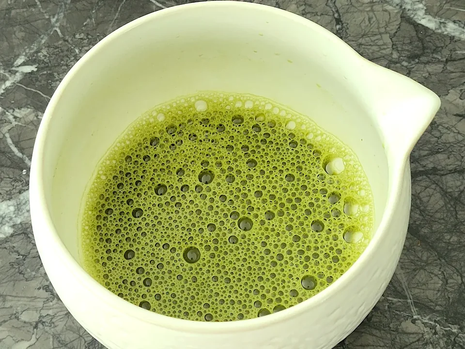 A bowl of whisked matcha green tea