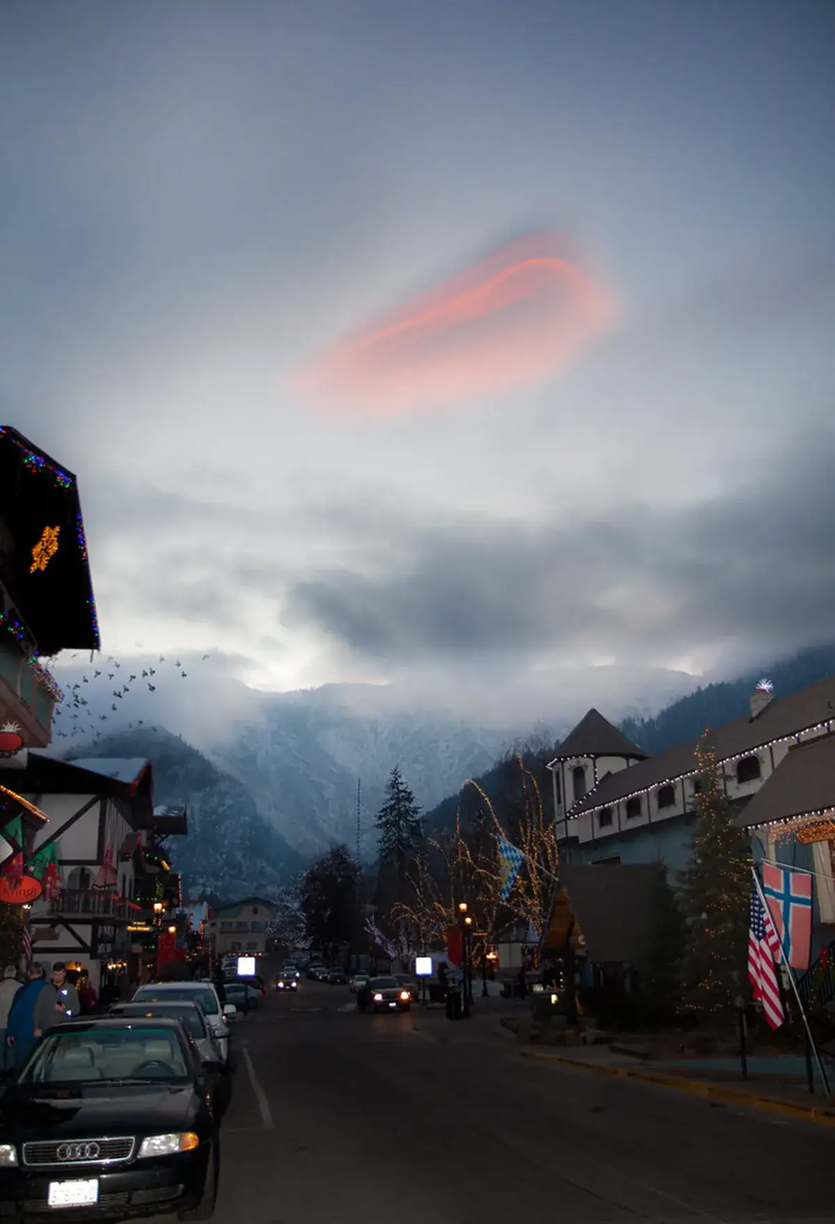 Snowy Front Street in Leavenworth with shoppers in winter gear