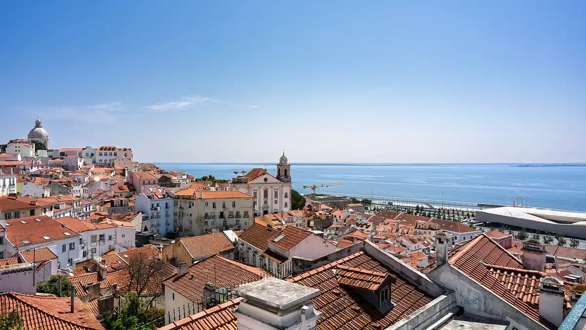 Alfama rooftops and the Tagus River, Lisbon