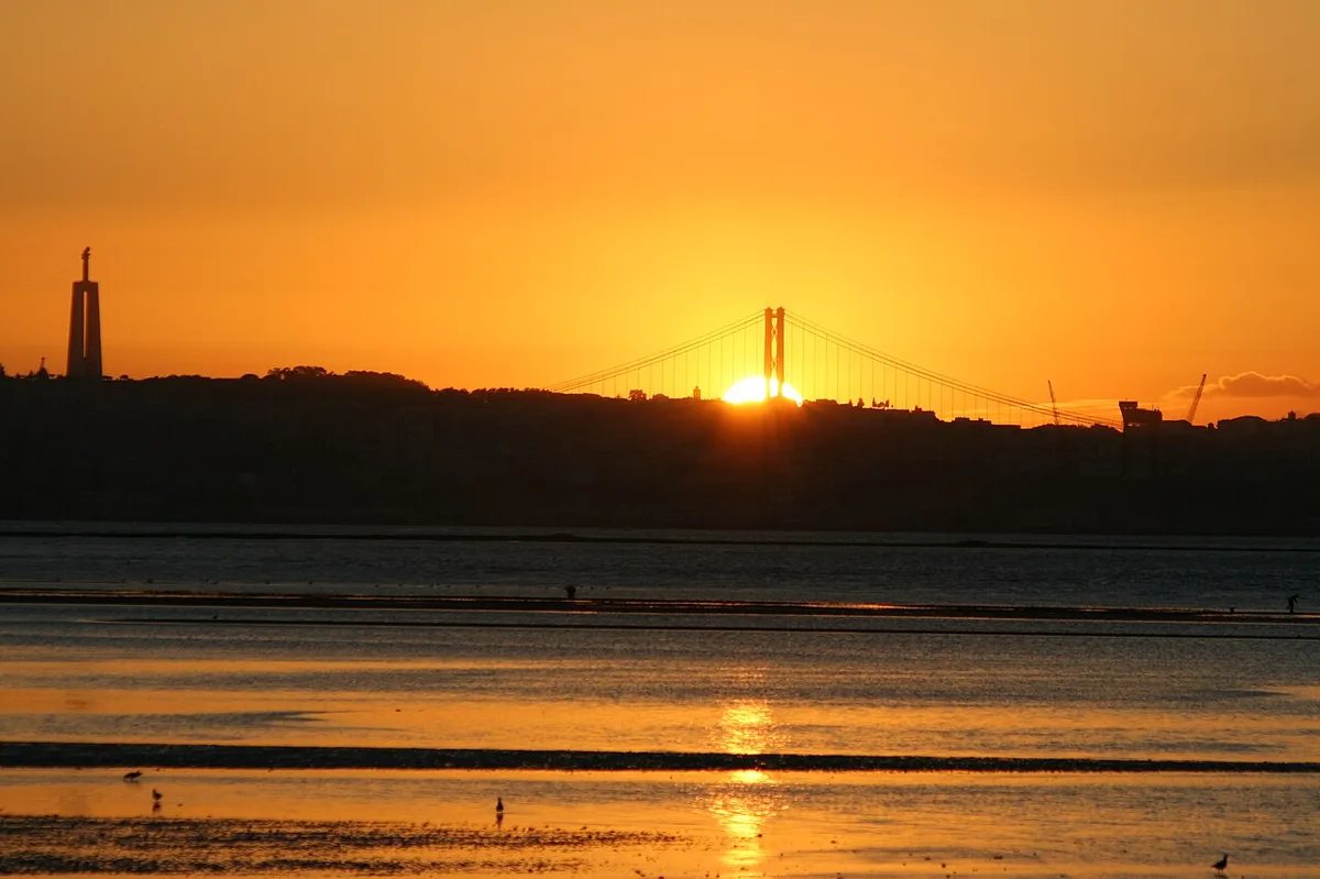 Sunset over the Tagus with the 25 de Abril Bridge, Lisbon
