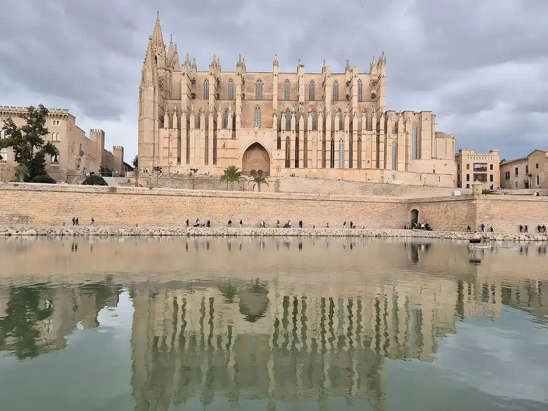 La Seu cathedral reflected in the water at Parc de la Mar, Palma