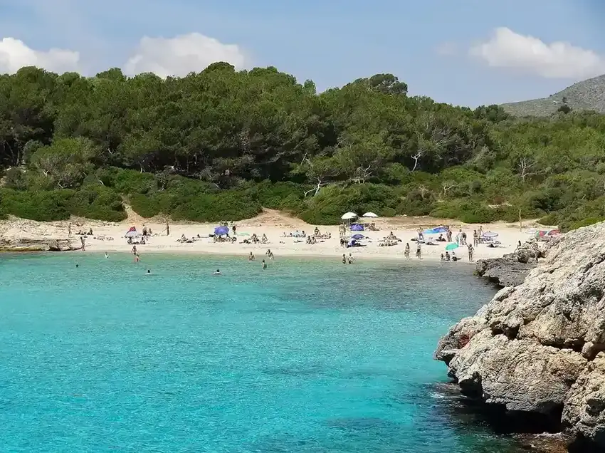 Turquoise water and white sand at Cala Varques