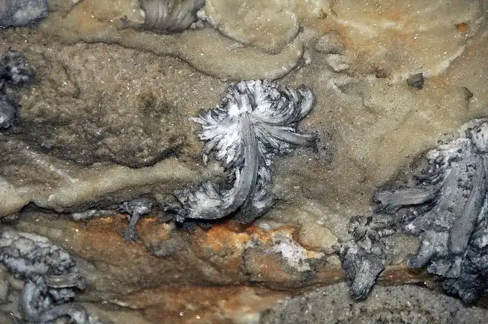 Lantern light glowing in a Mammoth Cave passage
