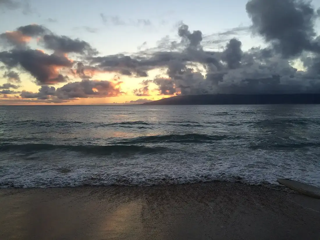 Nāpili Bay's calm crescent beach