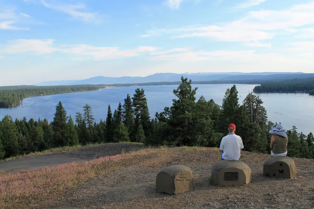 Hikers at an overlook above Payette Lake in Ponderosa State Park