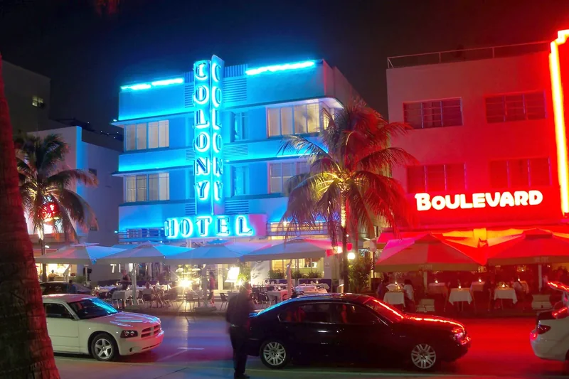 The Colony Hotel and its neighbors on Ocean Drive lit in neon at night