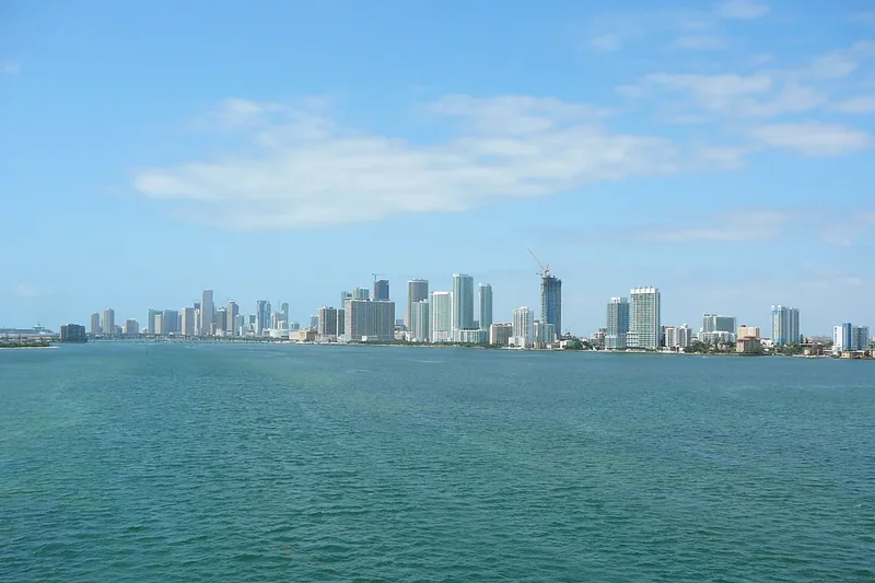 The downtown Miami skyline seen across the blue water of Biscayne Bay
