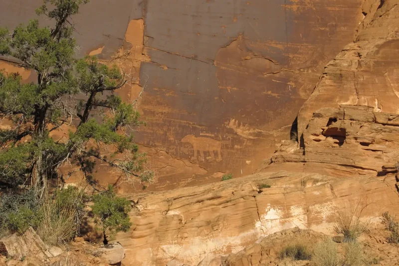 Petroglyphs pecked into a rock wall along Potash Road near Moab
