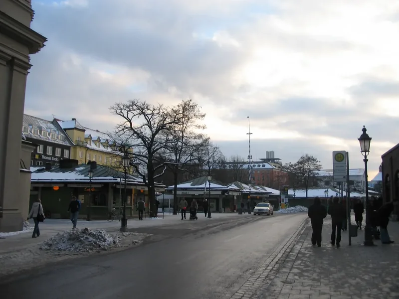 The Viktualienmarkt in Munich in winter with market stalls and the maypole