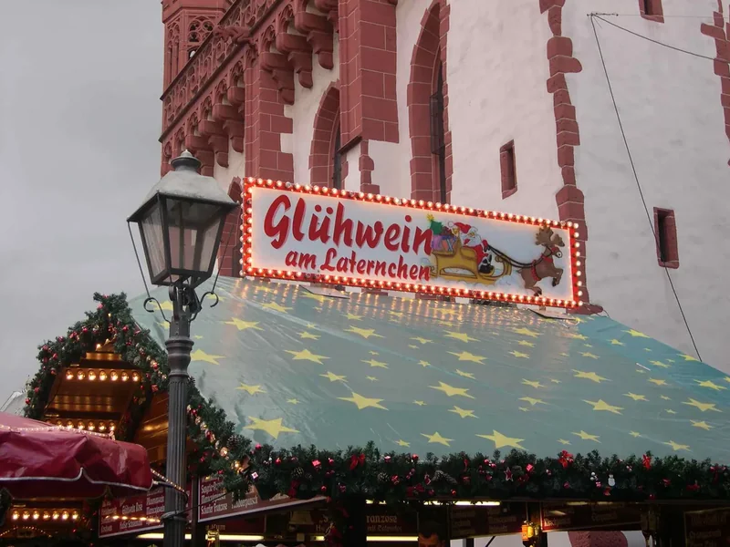 A mug of hot mulled wine at a Christmas market