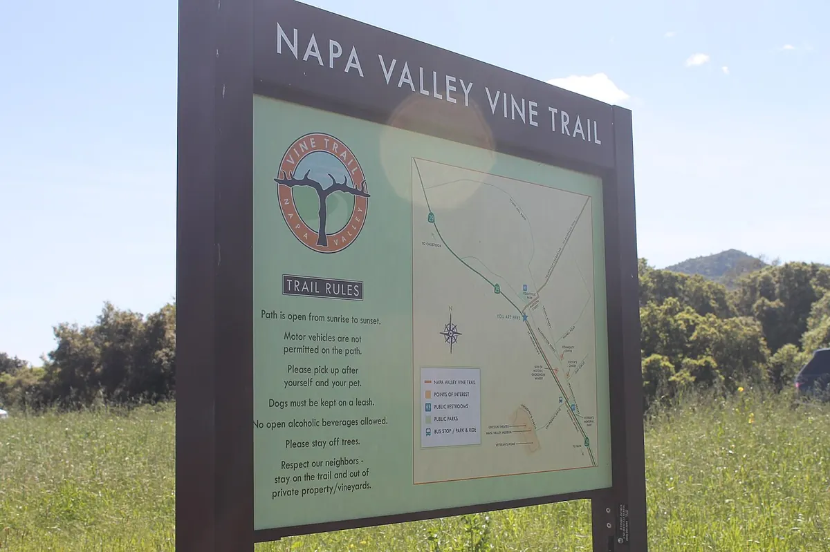 Napa Valley Vine Trail sign among the vines