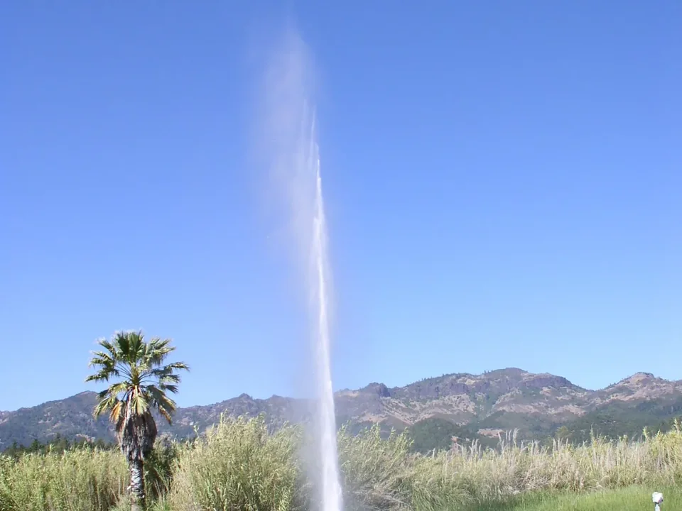 The Old Faithful Geyser of California shooting a column of water into the air